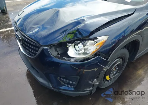 2016 Mazda Cx-5 Sport from USA, damaged, VIN JM3KE2BY7G0769024